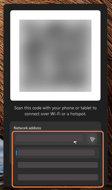 On Windows, choose another available address in the QR-code window, then scan the updated code.